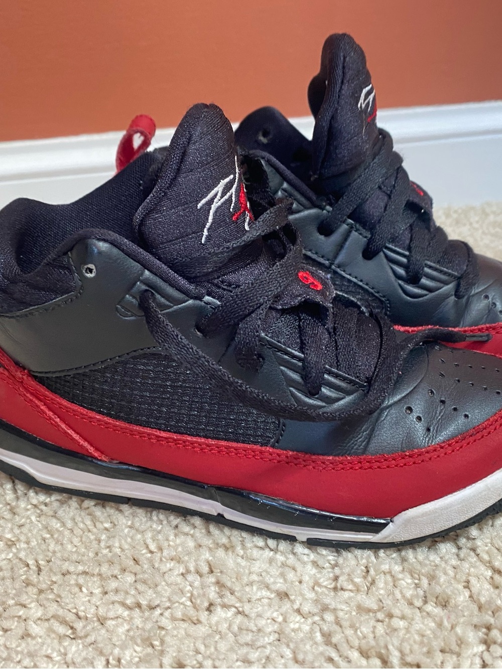 Kids Black and Red Jordan Athletic Sneakers